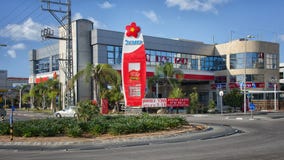 Two-story Sonol gas station building. Rishon Le Zion, Israel - January 9, 2016: Two-story Sonol gas station building consists of a variety of shops, cafe, coffee stock photos Two-story Sonol gas station building. Rishon Le Zion, Israel - January 9, 2016: Two-story Sonol gas station building consists of a variety of shops, cafe, coffee stock photos