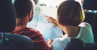 Two tourist traveler together hold in hands europe cartography, view and plan tourist way road, trip in transportation, couple royalty free stock photography Two tourist traveler together hold in hands europe cartography, view and plan tourist way road, trip in transportation, couple royalty free stock photography