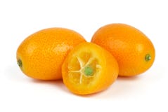 Two Whole And Sliced Kumquat Fruits Royalty Free Stock Photos Two Whole And Sliced Kumquat Fruits Royalty Free Stock Photos