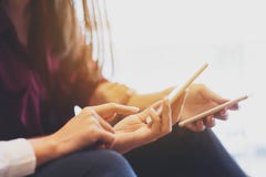 Two woman using smartphone sharing data, iot, internet of things Stock Image Two woman using smartphone sharing data, iot, internet of things Stock Image
