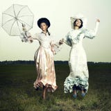 Two woman in vintage dress