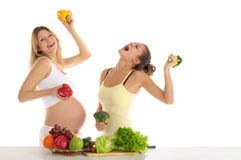Two Women Dance With Fruits And Vegetables Stock Photo