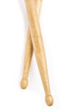 Two wooden drumsticks lying, isolated on a white background royalty free stock photography Two wooden drumsticks lying, isolated on a white background royalty free stock photography