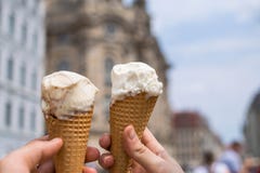 Two young hands holding ice cream royalty free stock images Two young hands holding ice cream royalty free stock images