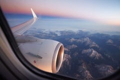 Type In The Window Of The Plane Of The Alps Royalty Free Stock Photo
