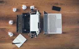 Typewriter Vs Laptop, Then And Now Royalty Free Stock Photos