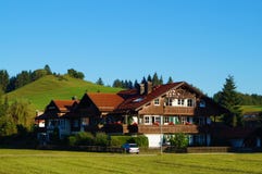 Typical wooden alpine house decorated with flowers. royalty free stock photography Typical wooden alpine house decorated with flowers. royalty free stock photography