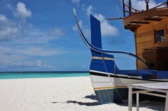 Typical wooden boat on the beach, Maldives Stock Image Typical wooden boat on the beach, Maldives Stock Image