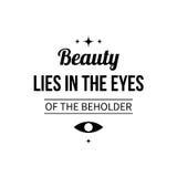 Typographic poster with aphorism Beauty lies in the eyes of the beholder Stock Images Typographic poster with aphorism Beauty lies in the eyes of the beholder Stock Images
