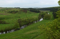 Ukrainian landscape in spring. Fields covered with green grass on the banks of the River skyline stock photos Ukrainian landscape in spring. Fields covered with green grass on the banks of the River skyline stock photos