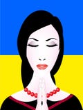 Ukrainian woman prays.