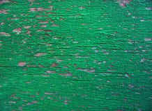 um surfaceold de madeira rachou a pintura verde sobre imagens de stock um surfaceold de madeira rachou a pintura verde sobre imagens de stock