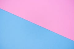 Un fondo di carta di due colori rosa e blu fotografie stock Un fondo di carta di due colori rosa e blu fotografie stock