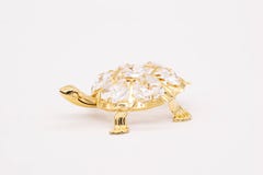 Un pequeño juguete es una tortuga fotografía de archivo Un pequeño juguete es una tortuga fotografía de archivo