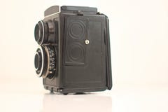 Una cámara del vintage que se ha aislado con el fondo blanco imagenes de archivo Una cámara del vintage que se ha aislado con el fondo blanco imagenes de archivo