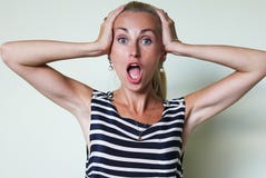 Una donna stupita con la bocca aperta Immagini Stock Libere da Diritti Una donna stupita con la bocca aperta Immagini Stock Libere da Diritti