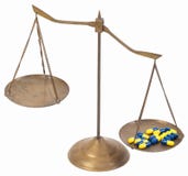 Unbalance of drug golden brass scales of justice stock photos Unbalance of drug golden brass scales of justice stock photos