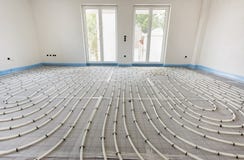 Underfloor θέρμανση στην κατασκευή στοκ εικόνες Underfloor θέρμανση στην κατασκευή στοκ εικόνες