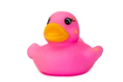 Une vue de c?t? d'un canard en caoutchouc rose photos libres de droits Une vue de c?t? d'un canard en caoutchouc rose photos libres de droits