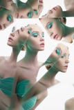 Ung härlig kvinna med ljus colorfullmakeup som isoleras på vit bakgrund royaltyfria foton Ung härlig kvinna med ljus colorfullmakeup som isoleras på vit bakgrund royaltyfria foton