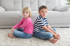 Unhappy siblings not speaking to each other Stock Photo Unhappy siblings not speaking to each other Stock Photo