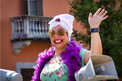 Unidentified happy woman participant during a local annual parade royalty free stock images Unidentified happy woman participant during a local annual parade royalty free stock images