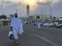 Unidentified Muslim pilgrims in white ihram cloth in Taif, Saudi Arabia. Stock Photo Unidentified Muslim pilgrims in white ihram cloth in Taif, Saudi Arabia. Stock Photo
