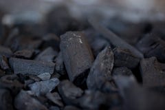 Unlit wood kol arkivfoto Unlit wood kol arkivfoto