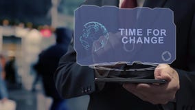 Businessman uses hologram Time for change