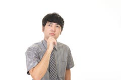 Uomo d'affari asiatico difficile immagine stock Uomo d'affari asiatico difficile immagine stock