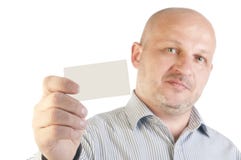 Uomo d'affari che tiene un biglietto da visita in bianco Fotografia Stock Libera da Diritti Uomo d'affari che tiene un biglietto da visita in bianco Fotografia Stock Libera da Diritti