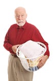 Uomo senior confuso con la lavanderia fotografia stock libera da diritti Uomo senior confuso con la lavanderia fotografia stock libera da diritti