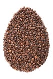 Uovo di Pasqua dai chicchi e dalle specie di caffè isolato su fondo bianco Fotografia Stock Libera da Diritti Uovo di Pasqua dai chicchi e dalle specie di caffè isolato su fondo bianco Fotografia Stock Libera da Diritti