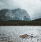 Upper Kananaskis Lake, Kananaskis Park, Alberta, Canada. 1-1 2 hour drive west of Calgary. Clouds and windy. stock photography Upper Kananaskis Lake, Kananaskis Park, Alberta, Canada. 1-1 2 hour drive west of Calgary. Clouds and windy. stock photography