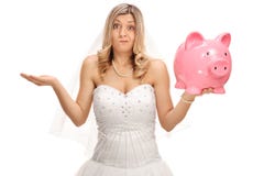 Upset bride holding a piggybank and gesturing with her hand Royalty Free Stock Image Upset bride holding a piggybank and gesturing with her hand Royalty Free Stock Image