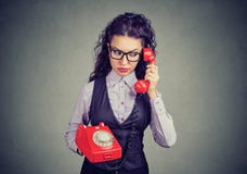 Upset woman speaking on telephone royalty free stock images Upset woman speaking on telephone royalty free stock images