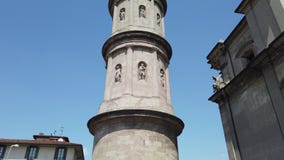 Urgnano, Bergamo, Italy. View of the bell tower of the main church in the center of the village stock video Urgnano, Bergamo, Italy. View of the bell tower of the main church in the center of the village stock video