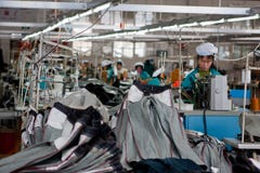 Usine de sueur de Chinois photo libre de droits Usine de sueur de Chinois photo libre de droits