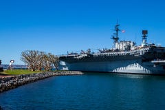The USS Midway, retired Navy ship, stands at San Diego harbor on Pacific Ocean royalty free stock photos The USS Midway, retired Navy ship, stands at San Diego harbor on Pacific Ocean royalty free stock photos