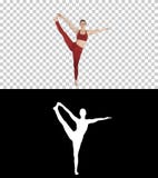 Йога молодой женщины практикуя, стоя в тренировке Utthita Hasta Padangustasana, выдвинутая рука к представлению большого пальца н стоковые изображения rf Йога молодой женщины практикуя, стоя в тренировке Utthita Hasta Padangustasana, выдвинутая рука к представлению большого пальца н стоковые изображения rf