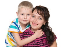 Uśmiechnięta matka z jej synem obraz stock Uśmiechnięta matka z jej synem obraz stock