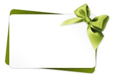 Vale-oferta com curva verde da fita no fundo branco Imagem de Stock Royalty Free Vale-oferta com curva verde da fita no fundo branco Imagem de Stock Royalty Free