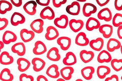 Valentine`s day decorative pattern red hearts confetti isolated on white background. Royalty Free Stock Images Valentine`s day decorative pattern red hearts confetti isolated on white background. Royalty Free Stock Images