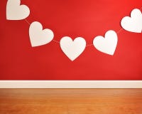 Valentine's Day Hanging Hearts on Red Background stock photo Valentine's Day Hanging Hearts on Red Background stock photo