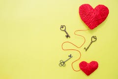 Valentines day card with red hearts and key on yellow background.Copy space.The metaphor of the key to heart. symbol royalty free stock images Valentines day card with red hearts and key on yellow background.Copy space.The metaphor of the key to heart. symbol royalty free stock images