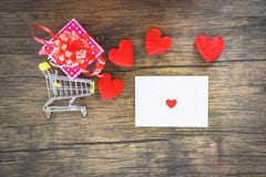 Valentines day shopping and red heart gift box on shopping cart and Envelope love mail Valentine Letter royalty free stock image Valentines day shopping and red heart gift box on shopping cart and Envelope love mail Valentine Letter royalty free stock image