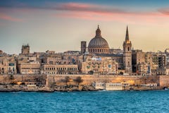 Valletta, Malta: skyline from Marsans Harbour at sunset stock image Valletta, Malta: skyline from Marsans Harbour at sunset stock image