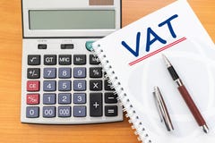 Value Added Tax VAT Finance Taxation Accounting Concept, VAT word handwritten on notebook