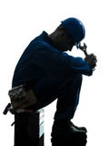 Van de de mensenarbeider van de reparatie silhouet van de de moeheidsmislukking het droevige royalty-vrije stock fotografie Van de de mensenarbeider van de reparatie silhouet van de de moeheidsmislukking het droevige royalty-vrije stock fotografie