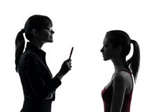 Van de de moedertiener van de leraarsvrouw het meisjesbespreking in silhouet uet royalty-vrije stock foto Van de de moedertiener van de leraarsvrouw het meisjesbespreking in silhouet uet royalty-vrije stock foto